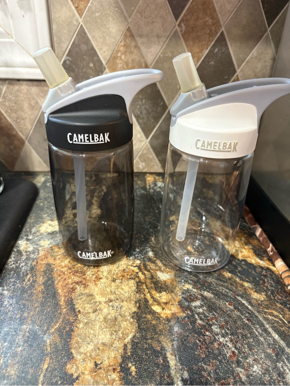 CamelBak Clear Kids Water Bottles with Black and White Lids straw